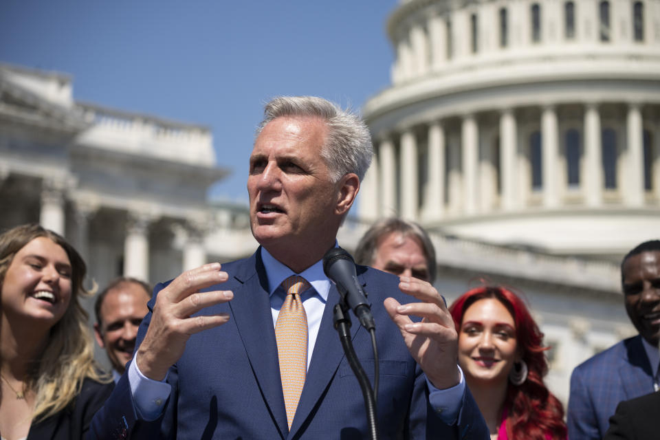 Speaker of the House Kevin McCarthy, R-Calif., and House Republicans celebrate passage in the House of a bill that would bar federally supported schools and colleges from allowing transgender athletes whose biological sex assigned at birth was male to compete on girls or women's sports teams, at the Capitol in Washington, Thursday, April 20, 2023. He is flanked at left by Macy Petty, a volleyball player who talked about competing against a transgender athlete, and Selina Soule, right, a Connecticut track and field athlete who sued the state over a transgender policy. (AP Photo/J. Scott Applewhite)