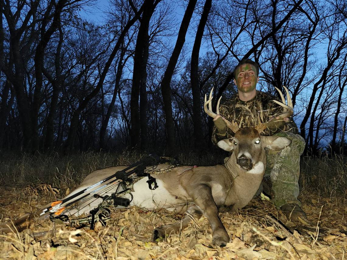 Michael Stavola poses with his Kansas white-tailed buck in 2022. The 10-pointer had a cut above its eye from fighting during the rut. Courtesy photo