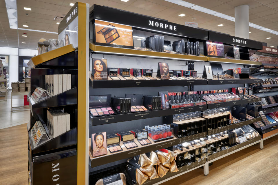 This undated image provided by Ulta Beauty shows makeup products on display at an Ulta Beauty store. Black and other darker-skinned women had long struggled to find makeup that matched or complemented their skin. But a widening array of products is showing up at mainstream retailers with an eye toward the multicultural consumer. At Ulta, shoppers can try on makeup using its GlamLab app that lets shoppers browse, filter and play around with products. (Vic Moss/Courtesy Ulta Beauty via AP)