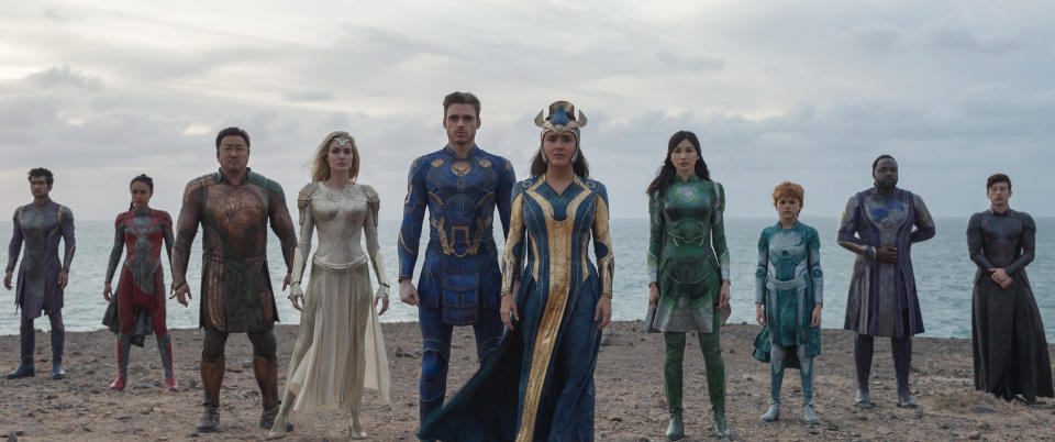 (L-R): Kingo (Kumail Nanjiani), Makkari (Lauren Ridloff), Gilgamesh (Don Lee), Thena (Angelina Jolie), Ikaris (Richard Madden), Ajak (Salma Hayek), Sersi (Gemma Chan), Sprite (Lia McHugh), Phastos (Brian Tyree Henry) and Druig (Barry Keoghan) in Marvel Studios' ETERNALS. (Photo courtesy of Marvel Studios)