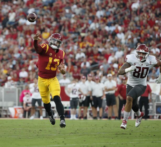 USC quarterback Caleb Williams (13) throws on the run during a 30-14 win over Washington State on Oct. 8, 2022.