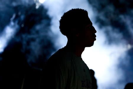 Feb 11, 2015; New Orleans, LA, USA; New Orleans Pelicans forward Anthony Davis is seen silhouetted during introductions before a game against the Indiana Pacers at the Smoothie King Center. The Pacers defeated the Pelicans 106-93.Mandatory Credit: Derick E. Hingle-USA TODAY Sports