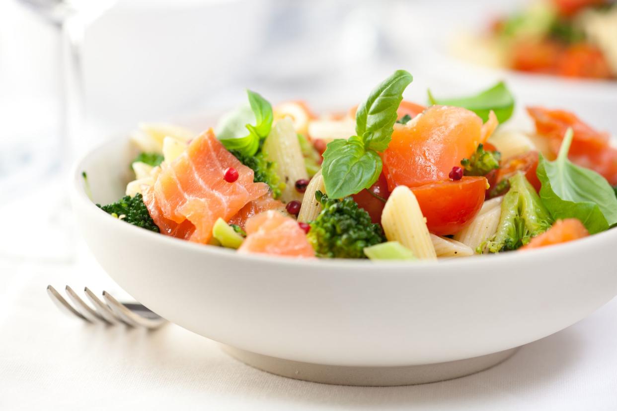 pasta salad with salmon,broccoli and fresh herbs