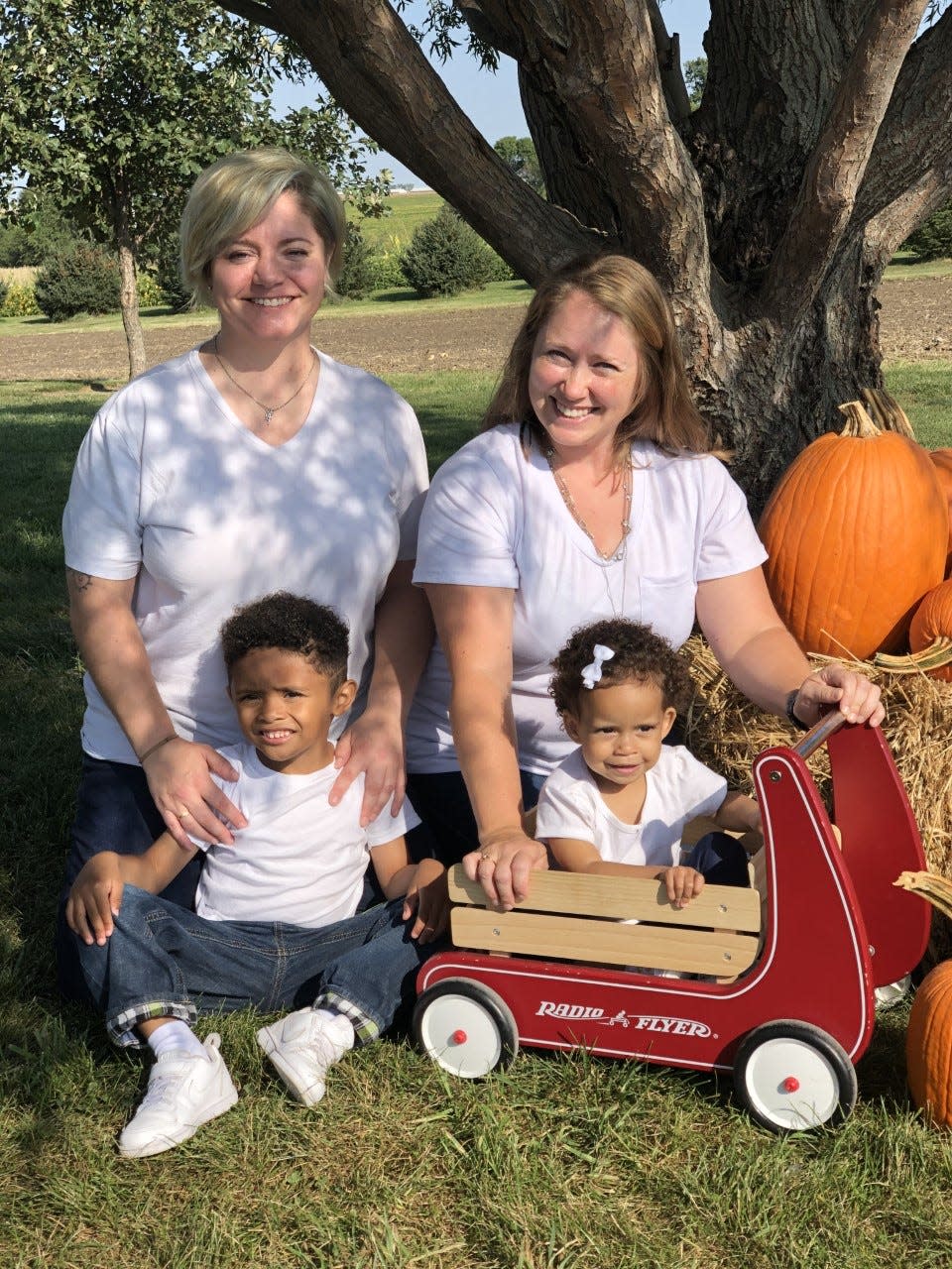 Tracy and Erin Almelien with their two children, Anders and Ellis. The couple, who live in Washington, Iowa, used midwives for prenatal care, a trend that is expected to grow in the state as rural birthing units shut down.