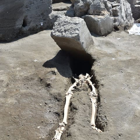 The stone slab decapitated the unfortunate Roman, archeologists said - Credit: Pompeii press office