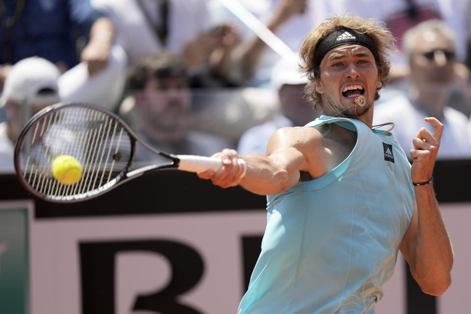 Alexander Zverev returns the ball to Sebastian Baez during their match at the Italian Open tennis tournament, in Rome, Wednesday, May 11, 2022. (AP Photo/Andrew Medichini)