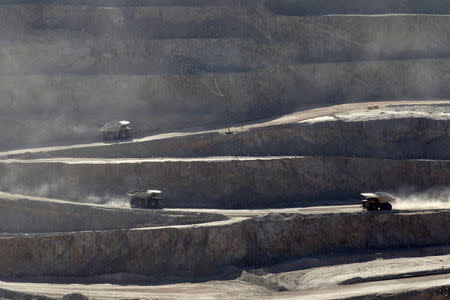 FILE PHOTO: Trucks travel along a road inside Chuquicamata open pit copper mine, which is owned by Chile's state-run copper producer Codelco, near Calama city, April 1, 2011. REUTERS/Ivan Alvarado/File Photo