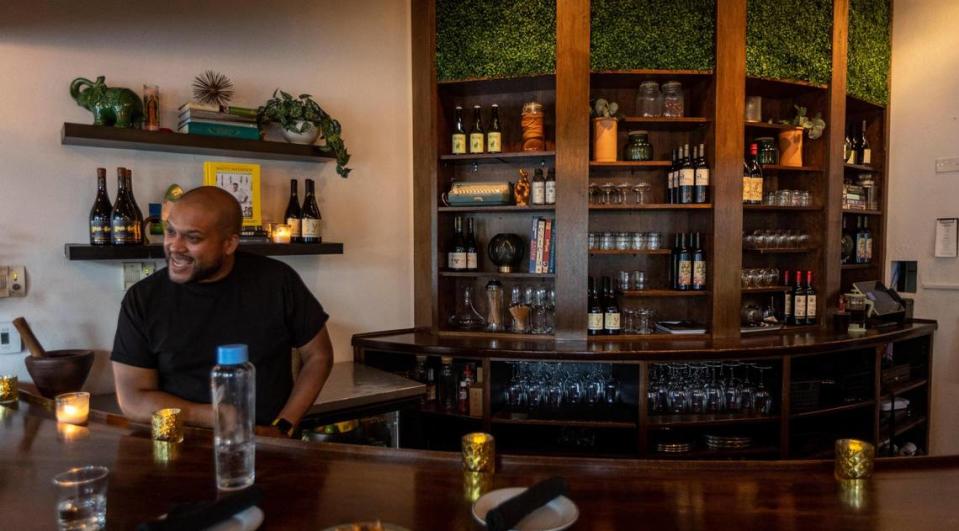 Chef Timon Balloo behind at the bar at The Katherine in Fort Lauderdale. Bar seats are usually reserved for walk-in diners without reservations.