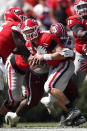 Georgia quarterback Jake Fromm (11) is sacked by South Carolina defensive lineman Javon Kinlaw (3) in the first half of an NCAA college football game Saturday, Oct. 12, 2019, in Athensw. (AP Photo/John Bazemore)