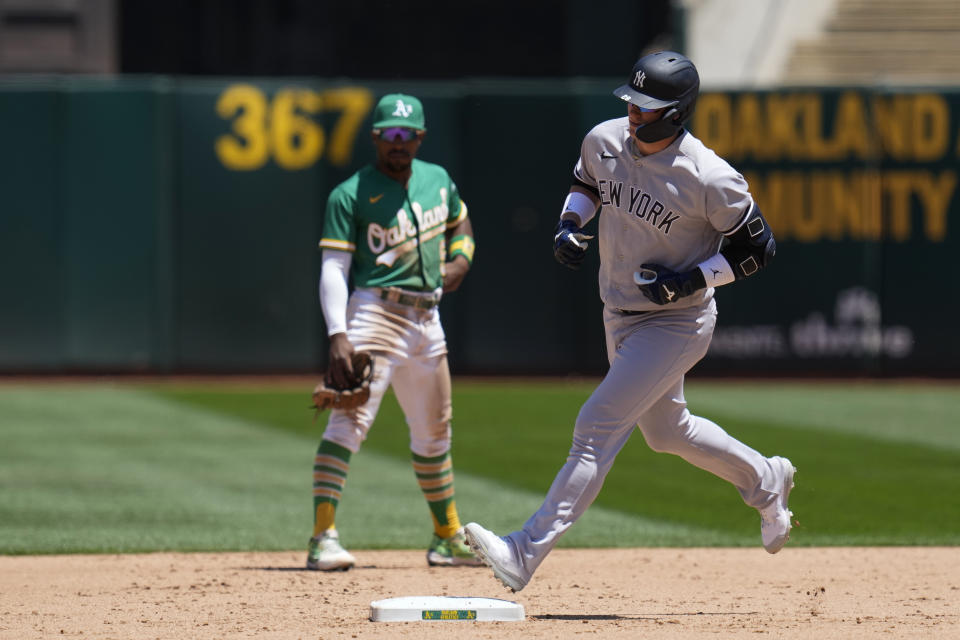 New York Yankees' Josh Donaldson, right, runs the bases after hitting a two-run home run against the Oakland Athletics during the sixth inning of a baseball game in Oakland, Calif., Thursday, June 29, 2023. (AP Photo/Godofredo A. Vásquez)