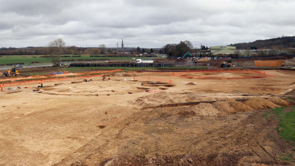 A view of the dirt excavation with the ring-like barrows.