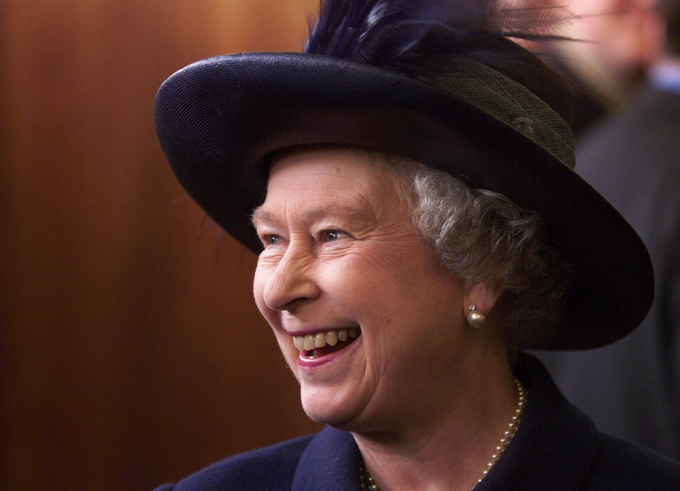 Britain's Queen Elizabeth II talks to students during an official visit to the University of Birmingham, central England, May 5, 2000. (AP Photo/Adam Butler/Pool)