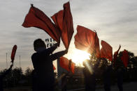 Members of Women's Union in Wonsan city make agitation activities to encourage workers during the rush hour in front of Haean Plaza in the city of Wonsan, Kangwon Province, North Korea DPRK, on Wednesday, Oct., 28, 2020. (AP Photo/Jon Chol Jin)