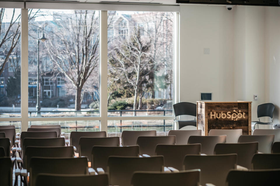 Chairs set up in front of a podium that says HubSpot