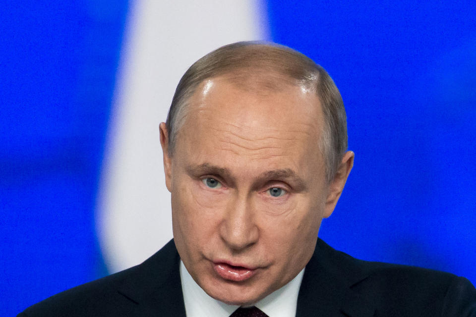 Russian President Vladimir Putin delivers a state-of-the-nation address in Moscow, Russia, Wednesday, Feb. 20, 2019. Putin sternly warned the United States against deploying new missiles in Europe, saying that Russia will retaliate by fielding new weapons that will take just as little time to reach their targets. (AP Photo/Alexander Zemlianichenko)