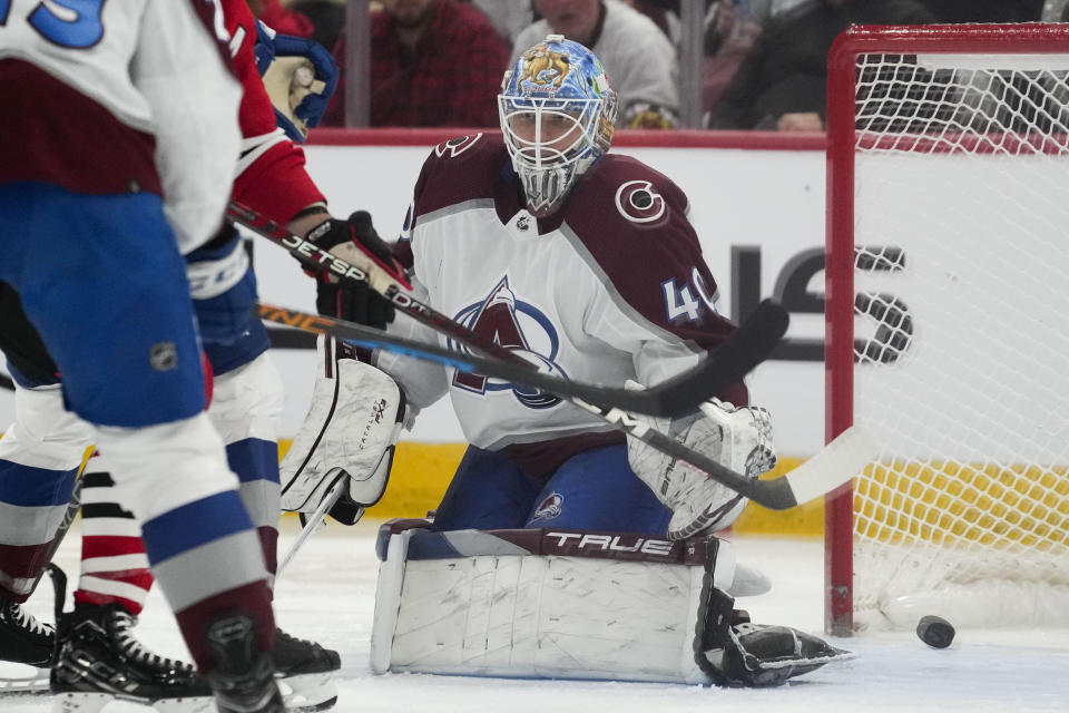 Colorado Avalanche goaltender Alexandar Georgiev loses sight of the puck but it does not go in the net during the second period of an NHL hockey game against the Chicago Blackhawks Tuesday, Dec. 19, 2023, in Chicago. (AP Photo/Erin Hooley)