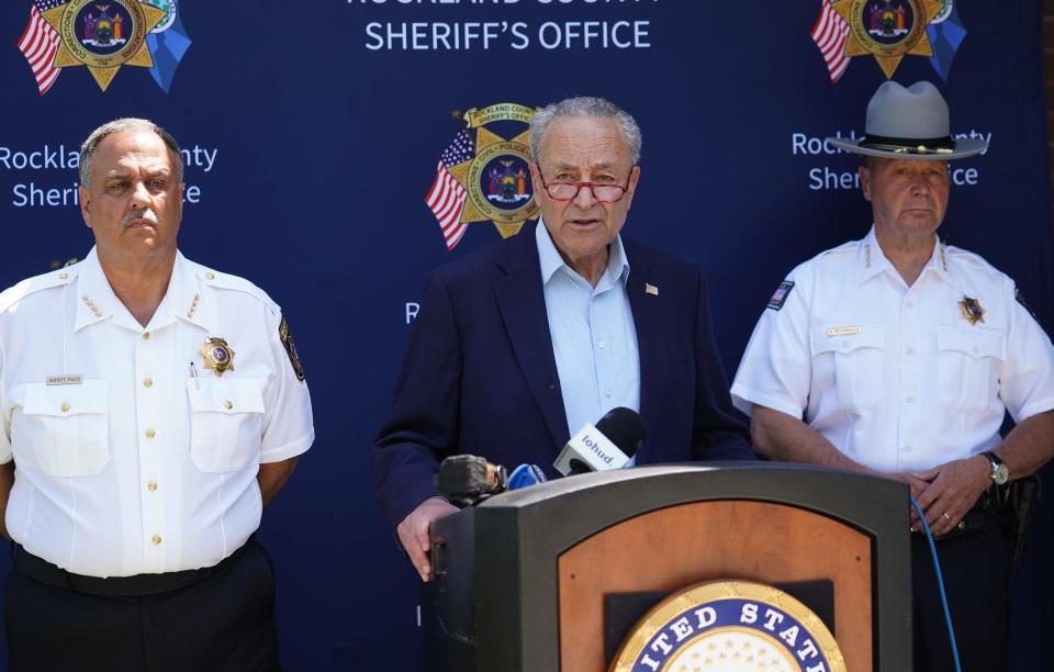 Senator Charles E. Schumer, center, speaks at the Rockland Co. Sheriff's office in New City. Wednesday, July 5, 2023.Surrounded by local law enforcement from across the Hudson Valley, Senator Charles E. Schumer reveals how years of bureaucratic delays have put millions in critical funding they are owed from the Federal Government for work officers did as a part of Westchester's DEA task force. 
