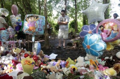 Corey Stroud prays at a Caylee Anthony memorial in Orlando, Florida, on Wednesday. (AP Photo: Alan Diaz)