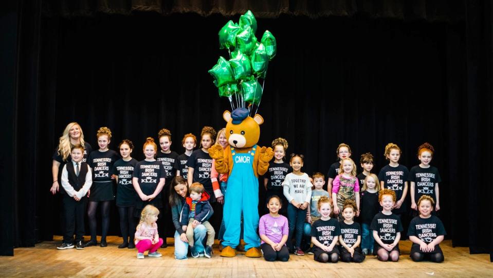 The Tennessee Irish Dancers, here at an earlier International Festival with the Children’s Museum mascot Charlie the Curious Bear, will entertain again with traditional Irish dance.