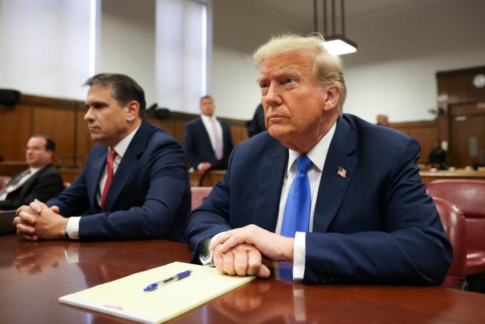 Donald Trump sits in a criminal courtroom in Manhattan on 22 April. (Getty Images)