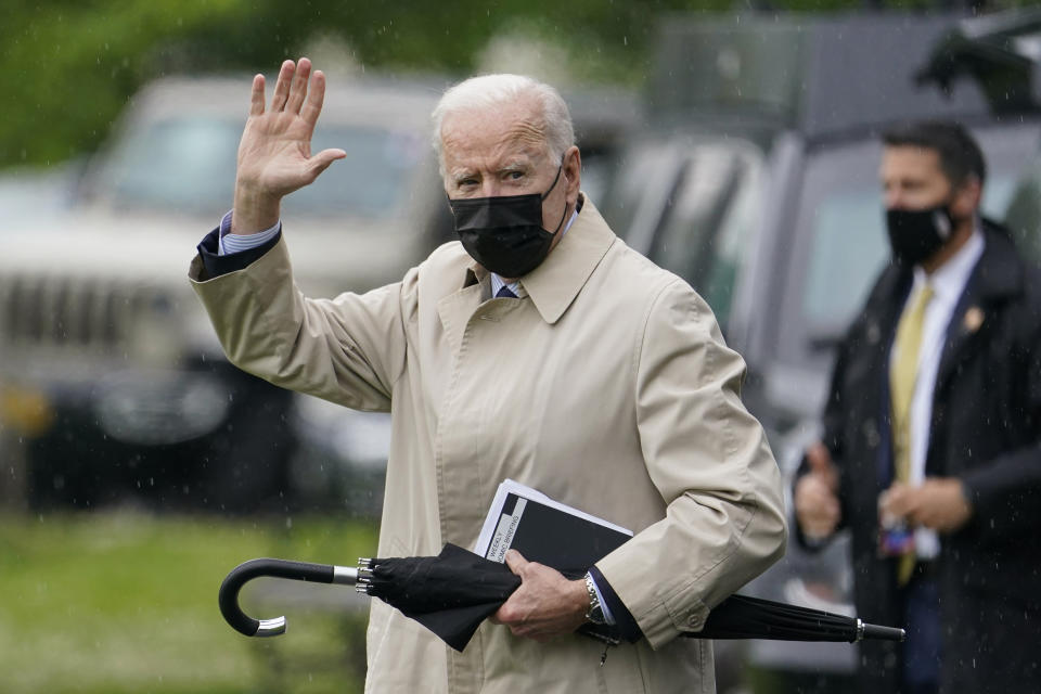 President Joe Biden waves as he walks to Marine One on the Ellipse near the White House, Friday, May 7, 2021, in Washington. Biden is spending the weekend at Camp David in Maryland. (AP Photo/Patrick Semansky)
