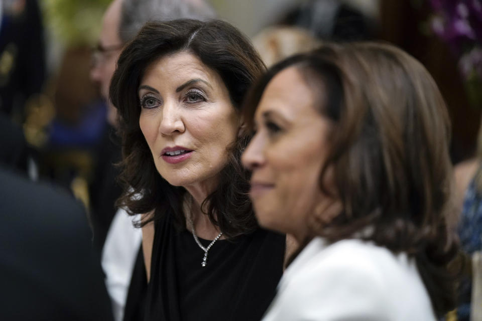 New York Gov. Kathy Hochul and Vice President Kamala Harris attend a dinner reception for governors and their spouses in the State Dining Room of the White House, Saturday, Feb. 11, 2023, in Washington. (AP Photo/Manuel Balce Ceneta)