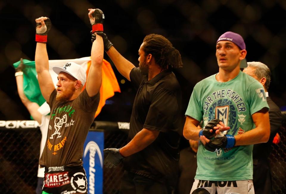 Conor McGregor is announced the winner against Max Holloway in their featherweight bout at TD Garden (Getty)