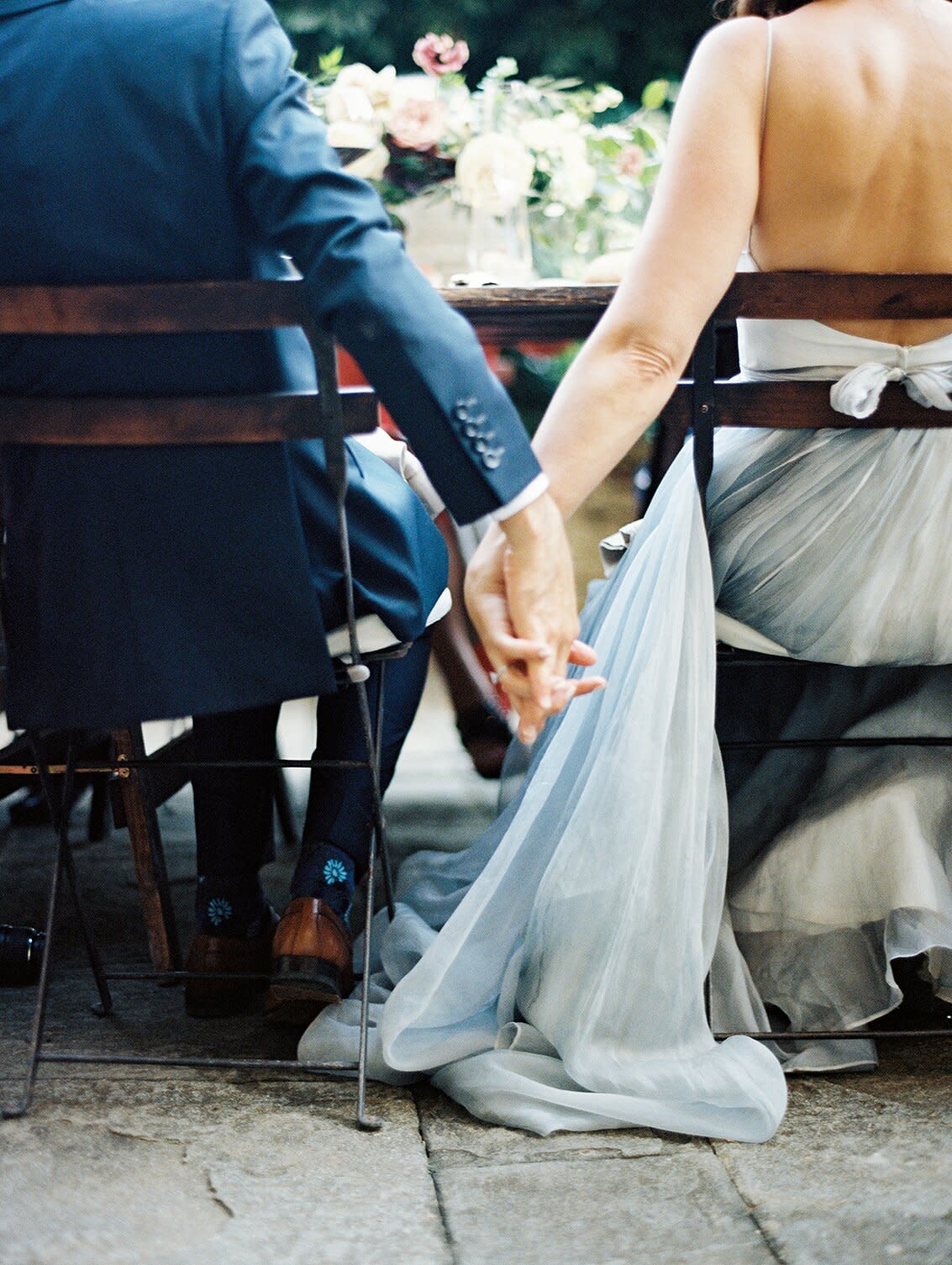 kelly pete wedding couple holding hands detail