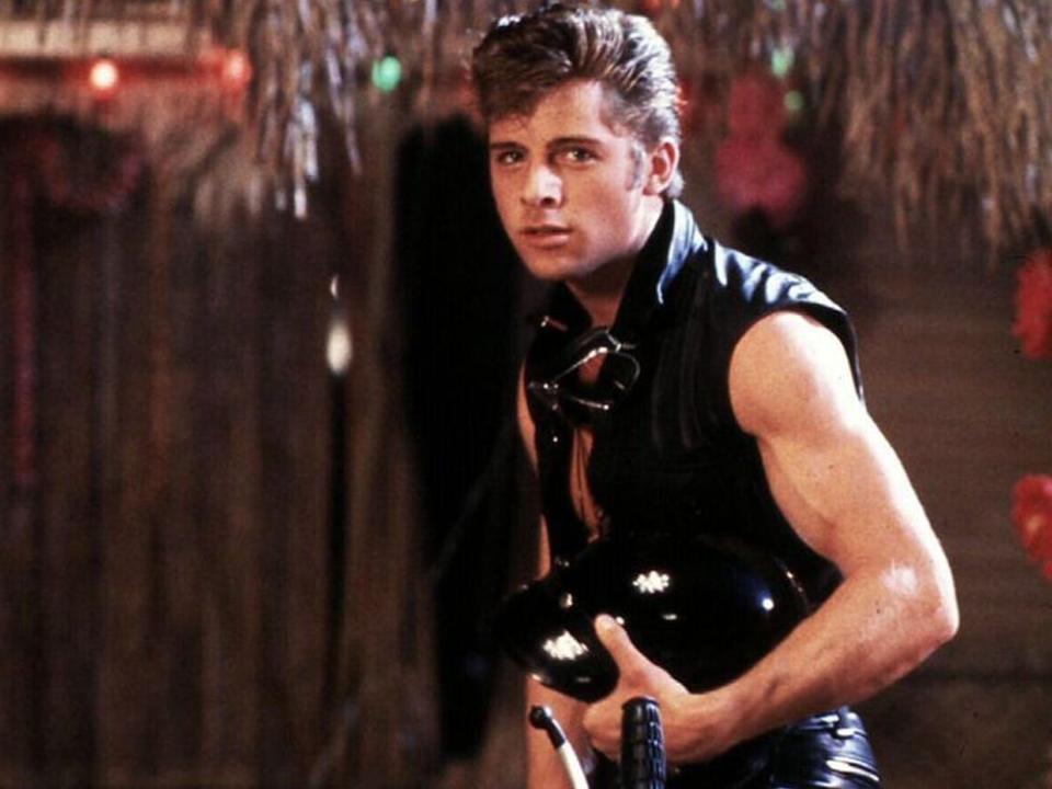 Maxwell Caulfield in a leather jacker on a motorcycle