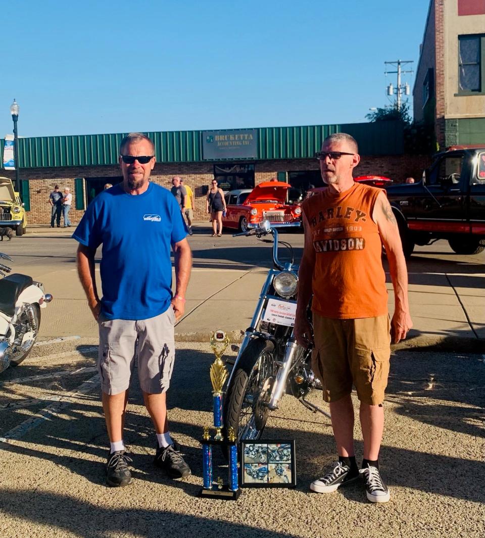 Brian Miars with  Windshield Specialists was the sponsor/judge for the Best of Show Motorcycle. Lance Tindall, Canton, received the award for his 1998 Harley Davidson Softail Custom.