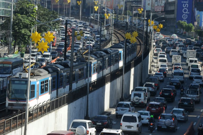 Japan is offering a $2.4 billion loan for a new railway aimed at easing Manila's notorious gridlock