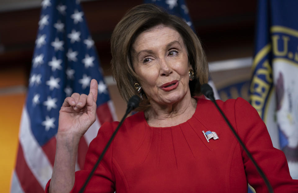 Speaker of the House Nancy Pelosi, D-Calif., talks to reporters on the morning after the first public hearing in the impeachment probe of President Donald Trump on his effort to tie U.S. aid for Ukraine to investigations of his political opponents, on Capitol Hill in Washington, Thursday, Nov. 14, 2019. Pelosi says the president's actions in the impeachment inquiry amount to "bribery." (AP Photo/J. Scott Applewhite)