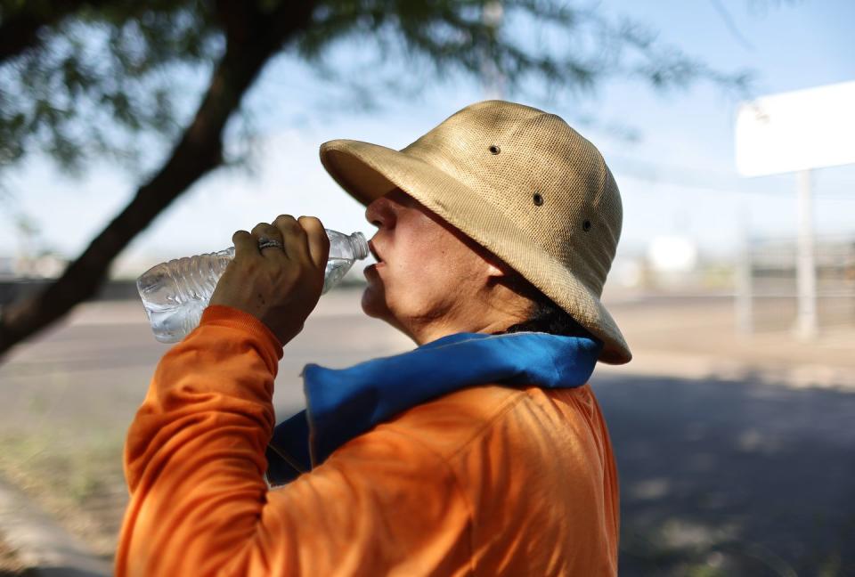 phoenix, arizona july 24 yolanda magana drinks water while taking a break from her work trimming trees ahead of monsoon season on july 24, 2023 in phoenix, arizona while phoenix endures periods of extreme heat every year, today is predicted to mark the 25th straight day of temperatures reaching 110 degrees or higher, a new record amid a long duration heat wave in the southwest scientists say it is likely that july will go down as the hottest month worldwide on record photo by mario tamagetty images