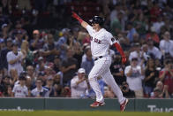 Boston Red Sox's Reese McGuire celebrates as he runs toward home after hitting a home run against the New York Yankees during the third inning of a baseball game Tuesday, Sept. 13, 2022, in Boston. (AP Photo/Steven Senne)