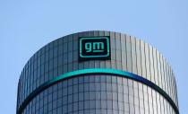 FILE PHOTO: Logo of GM atop the company headquarters