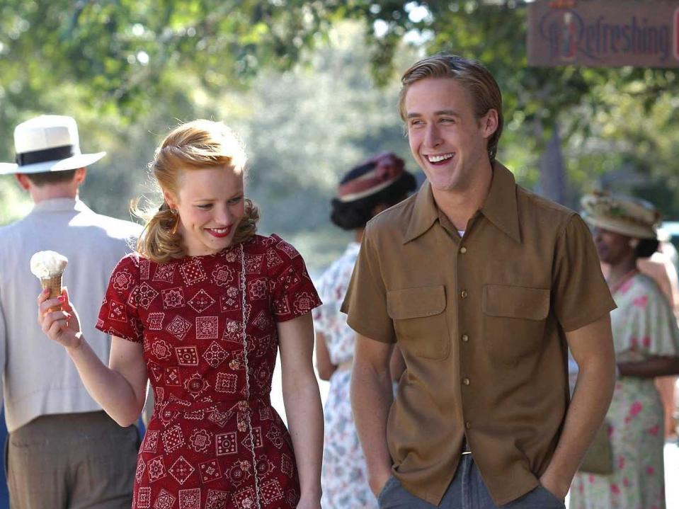 Allie and Noah walk along a street together in this still from "The Notebook."