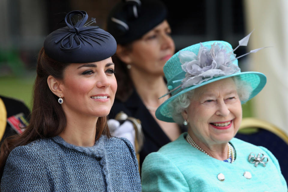 The Duchess of Cambridge and Queen Elizabeth II smile as they visit Vernon Park during a Diamond Jubilee visit to Nottingham on June 13, 2012.