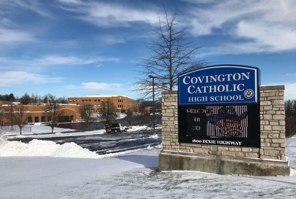 FILE - This Jan. 20, 2019 file photo shows the grounds of Covington Catholic High School in Park Hills, Ky. Nicholas Sandmann, the Covington Catholic High School teen at the heart of an encounter last month with a Native American activist, is suing The Washington Post for $250 million. He is also threatening legal action against The Associated Press and other news organizations. In papers filed Tuesday in federal court in Kentucky, Nicholas Sandmann and his parents alleged that the Post had engaged in “targeting and bullying” and modern “McCarthyism.” (AP Photo/Lisa Cornwell, File)