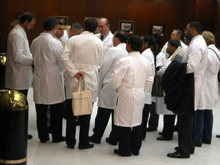 Doctors gathered around