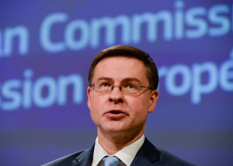 FILE PHOTO: Executive Vice-President Valdis Dombrovskis presents the EU executive's economic response to the coronavirus epidemic, in Brussels