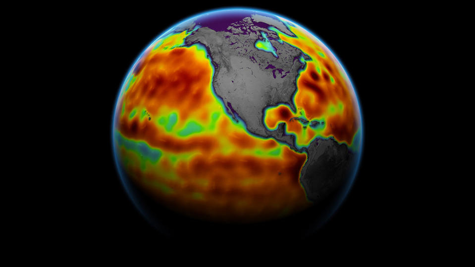     A thermal image of Earth showing gray landmasses and colorful oceans. 