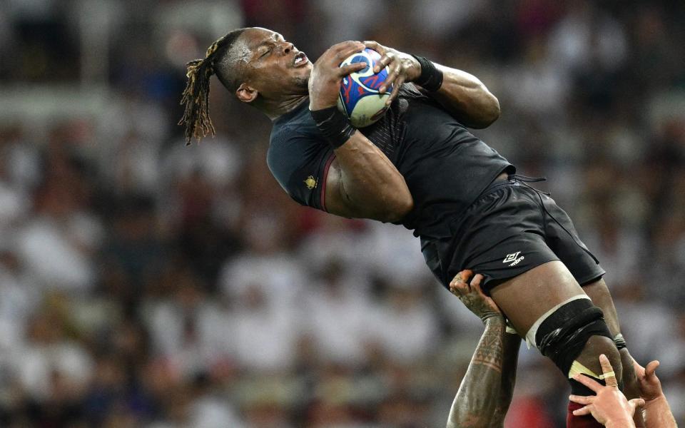 England's lock Maro Itoje grabs the ball in a line out vs Japan