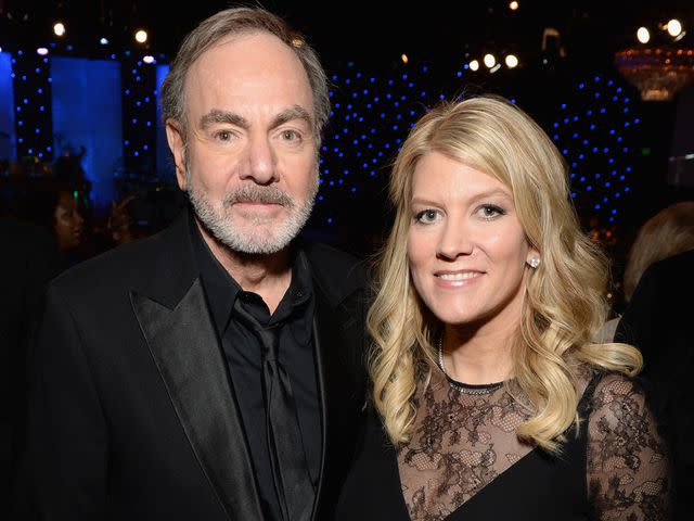 <p>Michael Kovac/WireImage</p> Neil Diamond and Katie McNeil at the 56th annual GRAMMY Awards Pre-GRAMMY Gala in 2014.