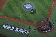 Members on the Los Angeles Dodgers take warms up during batting practice before Game 1 of the baseball World Series Series against the Tampa Bay Rays Tuesday, Oct. 20, 2020, in Arlington, Texas. (AP Photo/David J. Phillip)