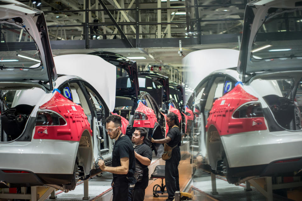 FEBRUARY 4, 2015 FREMONT, CA Workers assemble cars on the line at Tesla's factory in Fremont. David Butow (Photo by David Butow/Corbis via Getty Images)