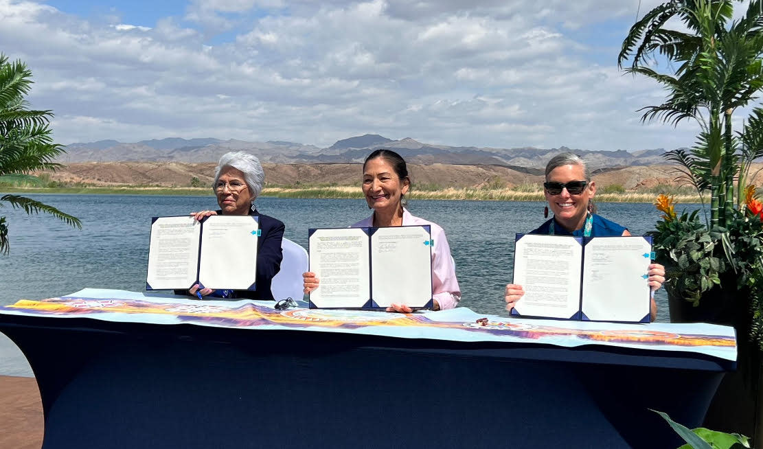 Interior Secretary Deb Haaland signs historic water rights agreement on Friday. (Photo/U.S. Dept. of the Interior)