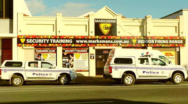 Police vehicles at Marksman indoor firing range this afternoon. Photo: Alex Fragnito, 7News.