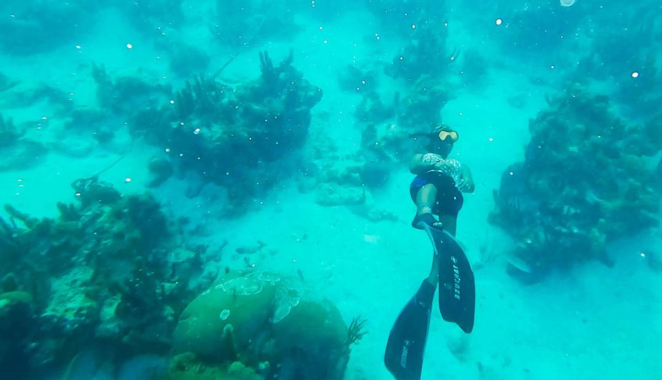 woman snorkeling underwater