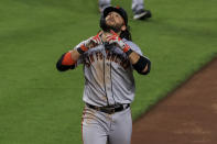 San Francisco Giants' Brandon Crawford runs the bases after hitting a solo home run during the seventh inning of a baseball game against the Cincinnati Reds in Cincinnati, Tuesday, May 18, 2021. (AP Photo/Aaron Doster)