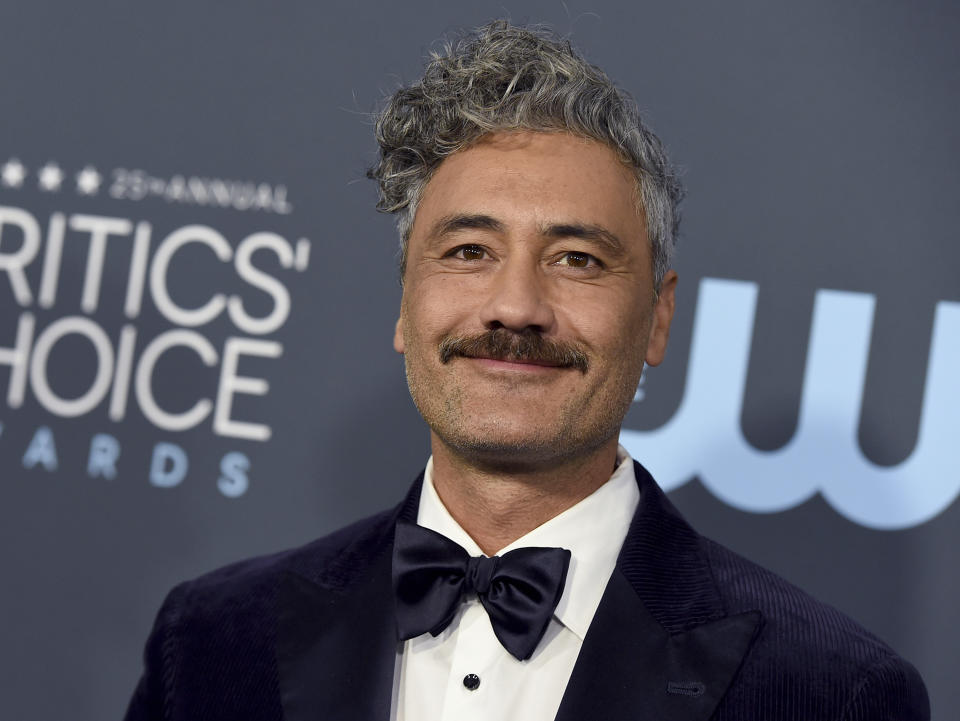 FILE - Taika Waititi arrives at the 25th annual Critics' Choice Awards on Jan. 12, 2020, in Santa Monica, Calif. Waititi is among the entertainers who took the initiative to make the best out of a challenging year. The filmmaker led a celebrity read-along of Roald Dahl's novel "James and the Giant Peach," to raise money for Partners in Health, a medical and social justice organization fighting COVID-19 and supporting public health systems in vulnerable areas around the world. (Photo by Jordan Strauss/Invision/AP, File)